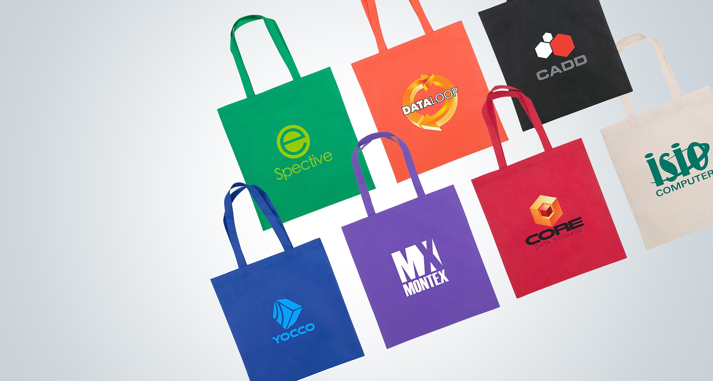 Custom imprinted bags in various colors on a gray background.