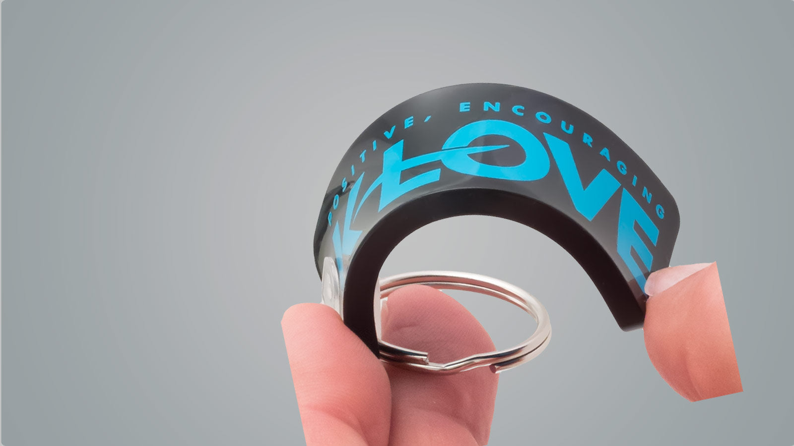 Custom shaped soft vinyl keychains in assorted colors.