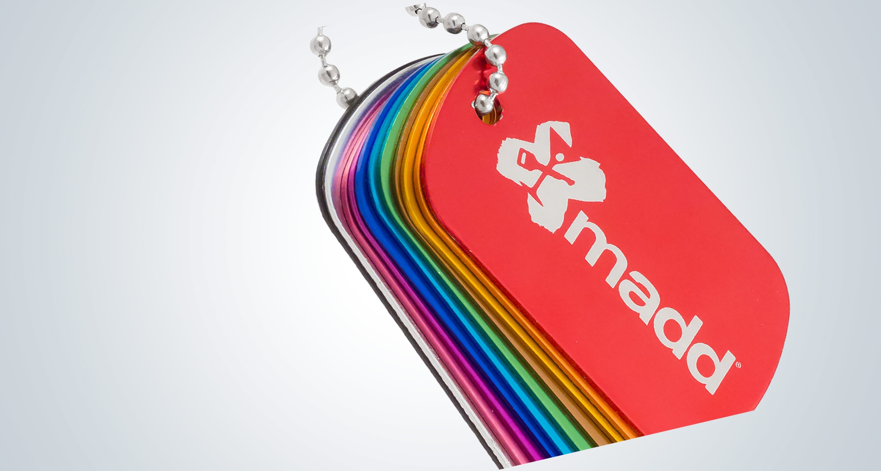 Customized dog tags in assorted metal finishes.