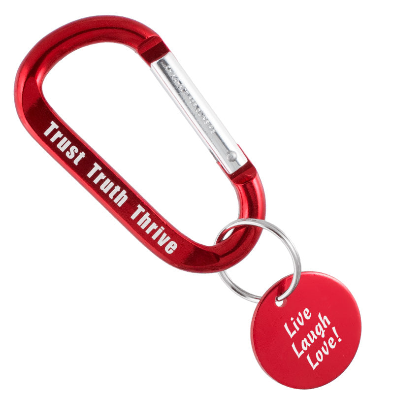 A closeup image of a red 60mm carabiner with medallion, on a white background.