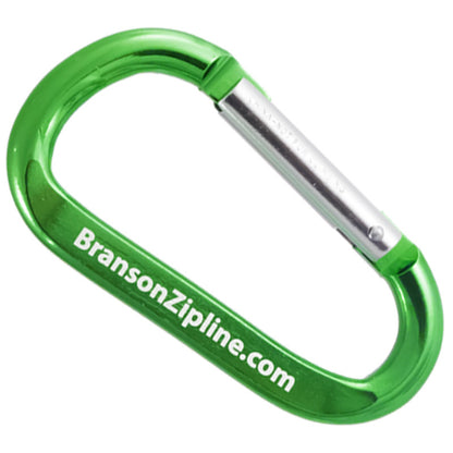 A closeup image of a 70mm green carabiner with a sample engraving, on a white background.