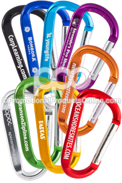 A group of 80mm carabiners in 9 different colors with sample engravings, on a white background.