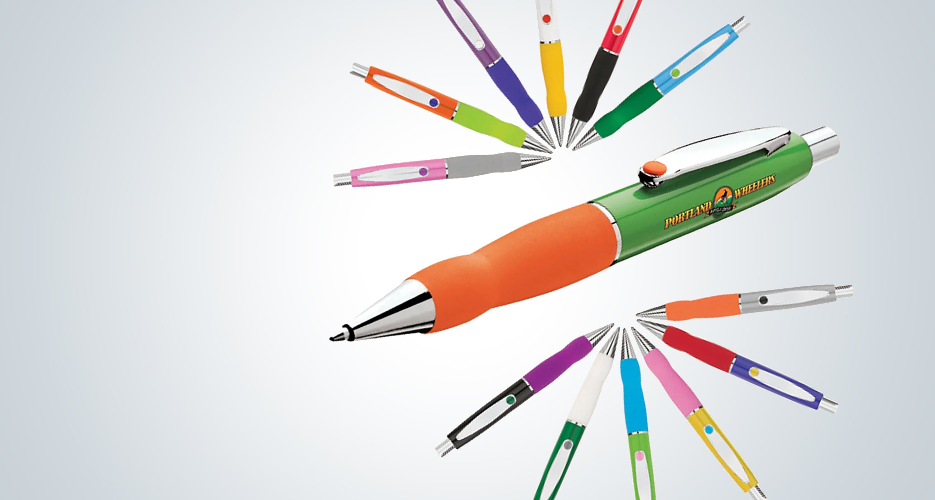 Colorful pens arranged in a circular pattern on a light gray background